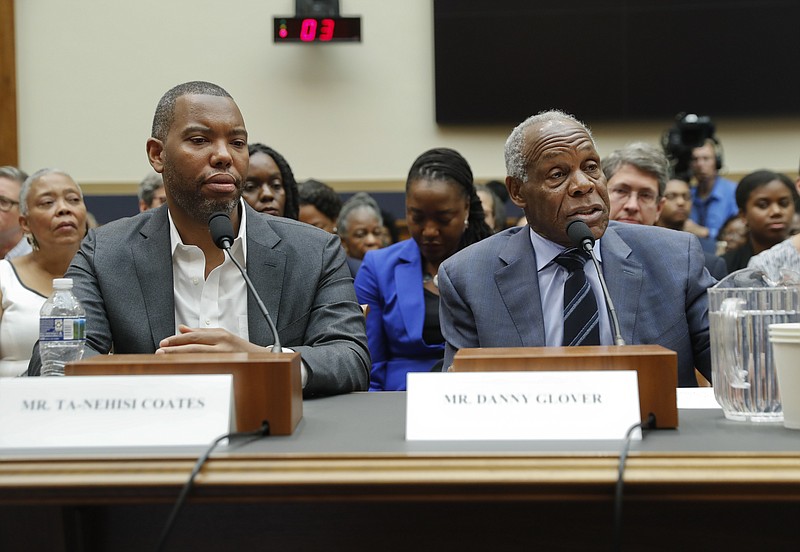 Actor Danny Glover, right, and author Ta-Nehisi Coates, left, testify about reparation for the descendants of slaves during a hearing before the House Judiciary Subcommittee on the Constitution, Civil Rights and Civil Liberties, at the Capitol in Washington, Wednesday, June 19, 2019. (AP Photo/Pablo Martinez Monsivais)