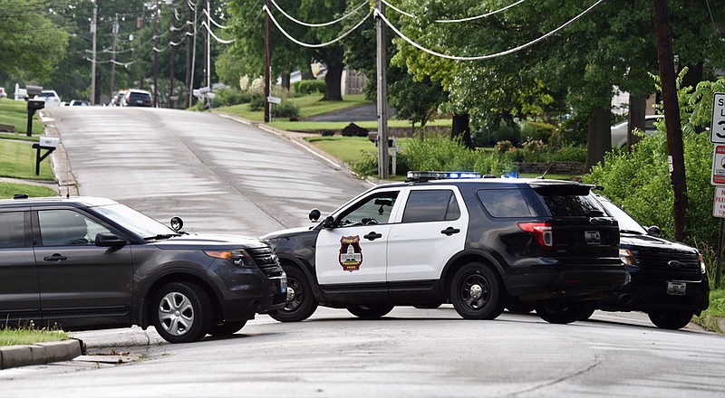 Jefferson City police have Boonville Road blocked at Belair Drive Wednesday evening, June 19, 2019, as city officers and the Missouri Highway Patrol conduct a manhunt in western Jefferson City.