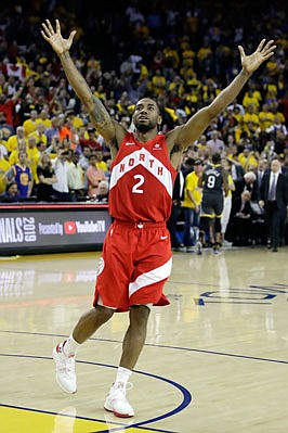 Kawhi Leonard celebrates after the Raptors defeated the Warriors to win the NBA title earlier this month in Oakland, Calif.