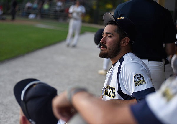 Renegades pitcher Manny Martinez watches his team play from the dugout during a June 10 game against St. Joseph at Vivion Field.