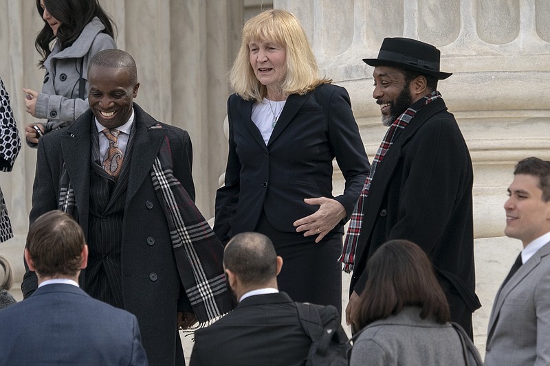 FILE - In this March 20, 2019 file photo, Attorney Sheri Johnson leaves the Supreme Court after challenging a Mississippi prosecutor's decision to keep African-Americans off the jury in the trial of Curtis Flowers, in Washington. The Supreme Court is throwing out the murder conviction and death sentence for Flowers because of a prosecutor's efforts to keep African Americans off the jury. The defendant already has been tried six times and now could face a seventh trial. The court's 7-2 decision Friday says the removal of black prospective jurors violated the rights of inmate Curtis Flowers. (AP Photo/J. Scott Applewhite)