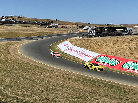 Daniel Hemric (left) and William Byron drive into "The Carousel" at Sonoma Raceway during NASCAR Cup Series practice Friday in Sonoma, Calif.