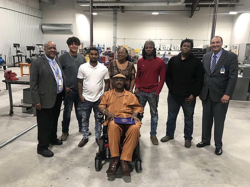 Texarkana College graduate William Blackwell, who is a retired welder, was recognized as one of the first black welders to be certified in plate steel in Texarkana. The other was the late William Thurston. Shown are, from left, Robert Jones, Luke Walker, Timothy Hardy, Marilyn Johnson, William Blackwell, Joshua Lawson, Dunye Sanders and Dr. Jason Smith. (Submitted photo)
