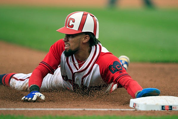 Billy Hamilton of the Royals slides safely into third with a stolen base during the fourth inning of Sunday afternoon's game against the Twins at Kauffman Stadium.