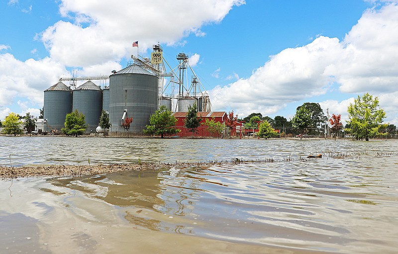 MFA Agri Services at 1009 4th St. in north Jefferson City is shown surrounded by high floodwaters Monday morning, June 24, 2019.