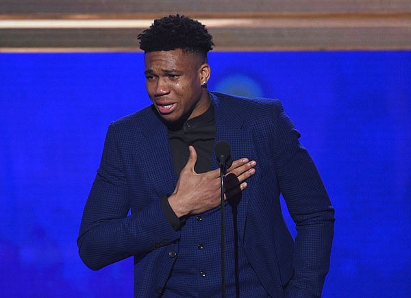 Giannis Antetokounmpo of the Bucks reacts as he accepts the Most Valuable Player award Monday at the NBA Awards at the Barker Hangar in Santa Monica, Calif.