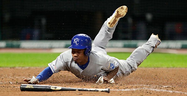 Terrance Gore of the Royals scores in the eighth inning of Monday night's game against the Indians in Cleveland.