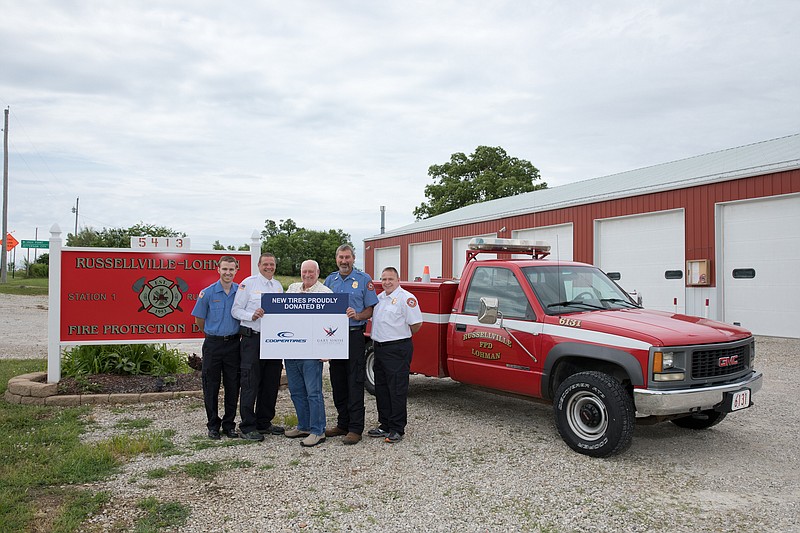 The Russellville Lohman Fire Protection vehicle received a donation of new tires for public service recognition week. (submitted photo)