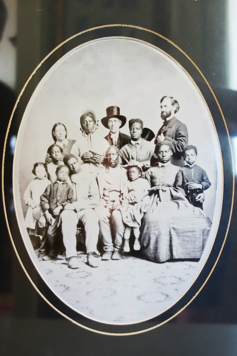 Abolitionist Levi Coffin, center, and Sylvia Rummel's ancestor Jonathan Cable, right, pose with a family of escaped slaves en route along the Underground Railroad. The only other known original print of this portrait recently sold at auction for $81,250.