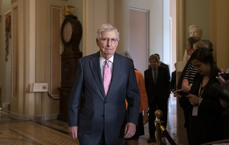 Senate Majority Leader Mitch McConnell, R-Ky., arrives to speak to reporters following the Republican Conference luncheon, at the Capitol in Washington, Tuesday, June 25, 2019. The GOP leader said his two priorities this week are to pass the National Defense Authorization Act and the border security bill. (AP Photo/J. Scott Applewhite)