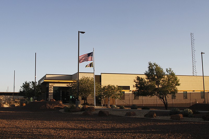 This June 20, 2019, image from video, shows the entrance of a Border Patrol station in Clint, Texas. Attorneys for a 7-year-old girl in government custody have sent legal notice to the Justice Department demanding her release. An attorney says that for four days her parents have been told she's "in transit," moving from one government facility to the next. Last week, attorneys visiting children in a Clint, Texas, Border Patrol station encountered the inconsolable girl amid conditions they said were perilous. Kids were taking care of kids, and there wasn't enough food, water or sanitation. (AP Photo/Cedar Attanasio)