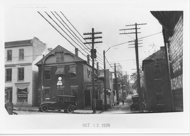 <p>Summers collection, Mo State Archives</p><p>ABOVE: The Capitol Telephone Company office is seen at the corner of Madison and the alley.</p>