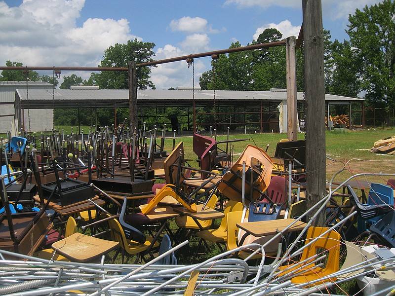 The Bright Star School District Agriculture Learning Center sits partially dismantled in Doddridge, Ark.