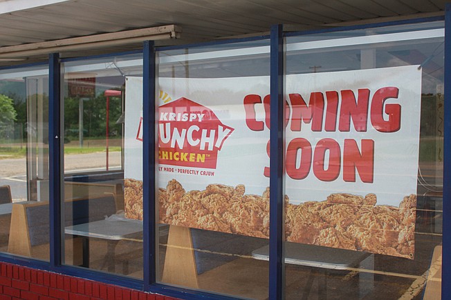 A banner is displayed inside the former Dairy Queen building on East Street in Texarkana, Ark. A new eatery, the Daily Restaurant, will serve Krispy Krunchy Chicken among other things. The new restaurant is expected to open by the end of September.
