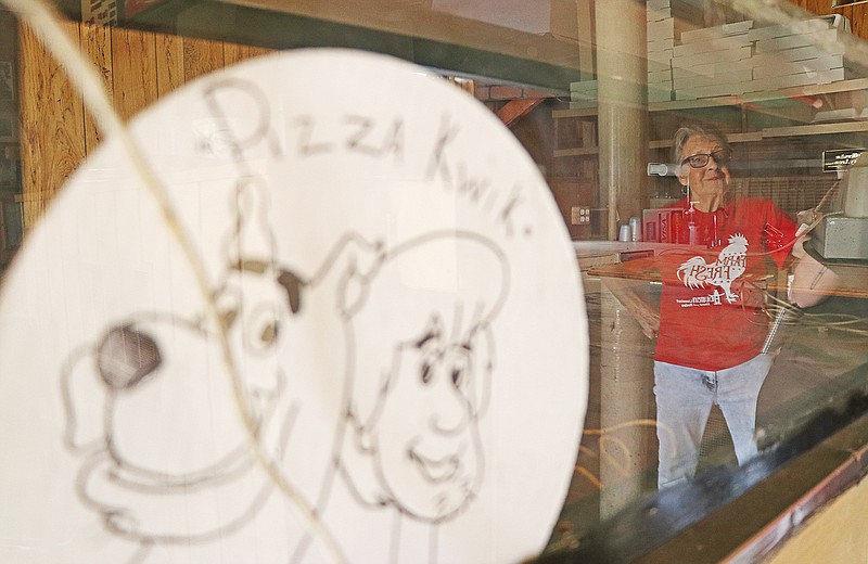Former co-owner Judy Huber reminisces Monday on the memories made at Pizza Kwik, a popular Jefferson City stop. The restaurant closed its doors back in 2017. Now, almost two years later, co-owner Judy Huber decided to sell the building.