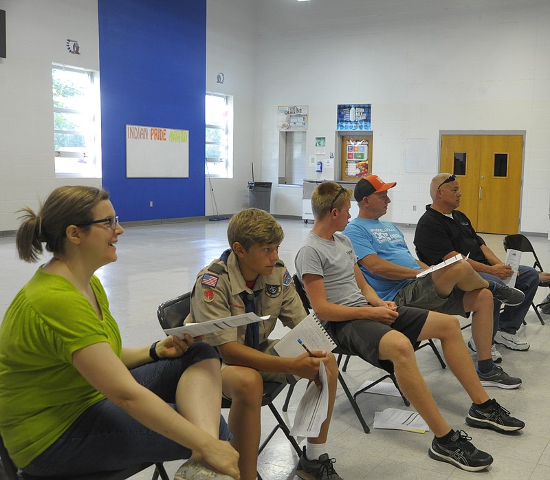 <p>Danisha Hogue/News Tribune</p><p>Attendance at the Russellville Community Development Block Grant hearing June 27 included city officials, area Boy Scouts and resident Russell Wilson.</p>