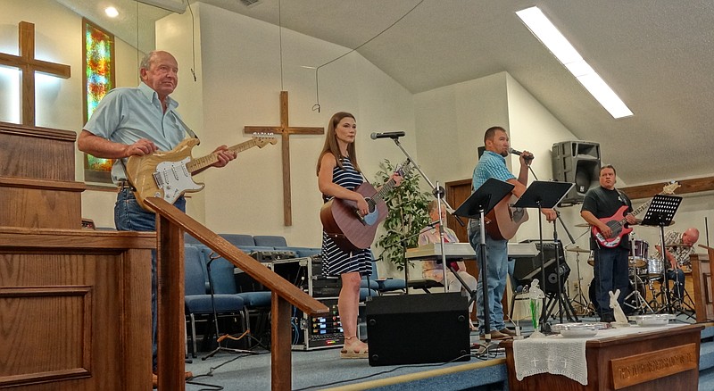 Crosscreek Cowboy Church's worship band is shown during a singing at the Open Door Baptist Church in Atlanta. Performers are, from left, Phil Cox, Emilee Reynolds, Deb Orendt, Scott Venable, Bobby Sepulveda and Mack McKenzie.
