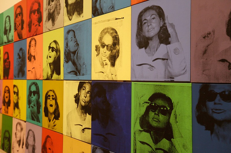 In this photo taken Wednesday, May 15, 2019, is the piece called "Ethel Scull 36 Times" at the exhibition, "Andy Warhol _ From A to B and Back Again" in San Francisco. A retrospective of Andy Warhol's work on display at the San Francisco Museum of Modern Art captures his use of artwork to give his subjects personas the way people do now using social media.   (AP Photo/Eric Risberg)