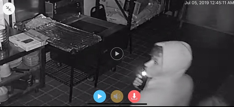 Fulton police pulled this image of a suspect in a series of commercial burglaries from video surveillance at one of five affected businesses.