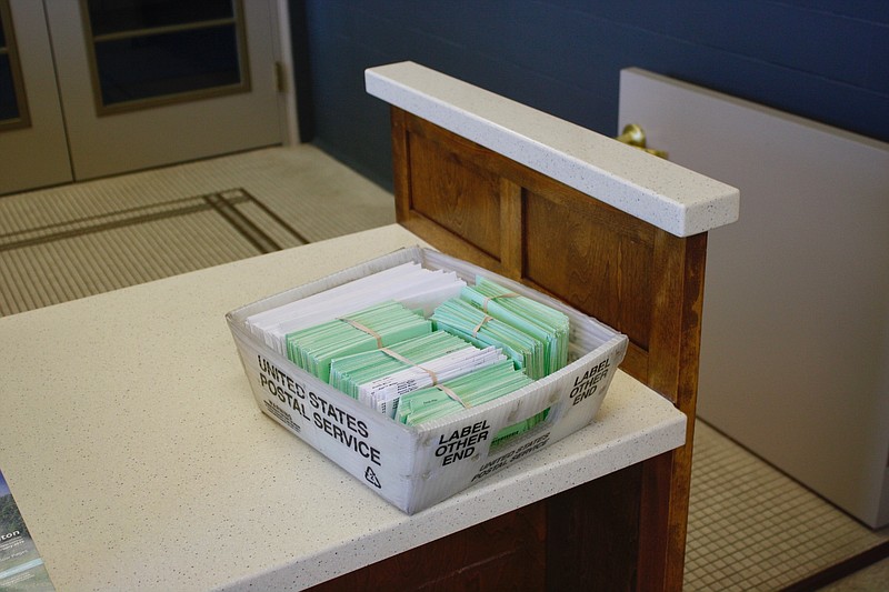 Green voter identification cards are sent out by the Callaway County Clerk's office as a part of bi-annual voter canvassing. The process is being handled in-house this year, as opposed to when the Edward J. Rice Company handled it.