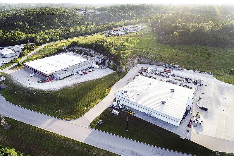 In addition to Braun Auto Repair and Storage Units being heavily damaged in the May 22, 2019, tornado, nearby businesses also sustained damage. At left is Missouri Furniture, which remained closed as of early July as roofers neared completion of work. Tractor Supply Company, at right, was open as of early July with leaks in the roof and temporary air conditioning in place. In the near background is 54 Store More, which sustained heavy damage, and in the distant background is Missouri Builders Service on Route CC.
