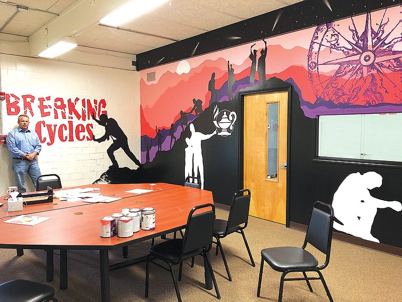 Mineral Springs, Ark.-based artist Erica Fry has created a mural depicting the philosophy of the Creative Action Team School of the Hope Public Schools under a commission by CATS Principal Mike Radebaugh. (Submitted photo)

