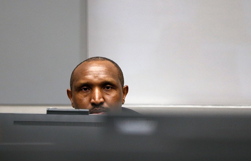 Congolese militia commander Bosco Ntaganda sits in the courtroom of the ICC (International Criminal Court) during his trial at the Hague in the Netherlands, Monday July 8, 2019. The ICC is expected to pass judgement Monday on Ntaganda, accused of overseeing the slaughter of civilians by his soldiers in the Democratic Republic of Congo in 2002 and 2003. (Eva Plevier/Pool via AP)