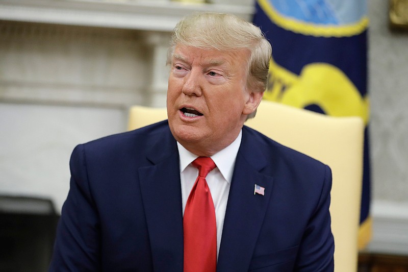 President Donald Trump meets with Qatar's Emir Sheikh Tamim Bin Hamad Al-Thani in the Oval Office of the White House, Tuesday, July 9, 2019, in Washington. (AP Photo/Evan Vucci)