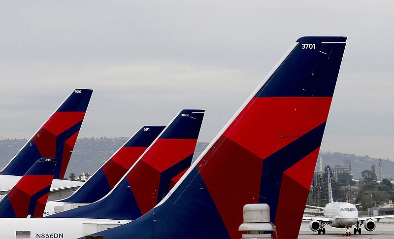 Delta Airlines aircraft are lined up at Terminal 5 in Los Angeles International Airport on December 21, 2016. (Luis Sinco/Los Angeles Times/TNS)