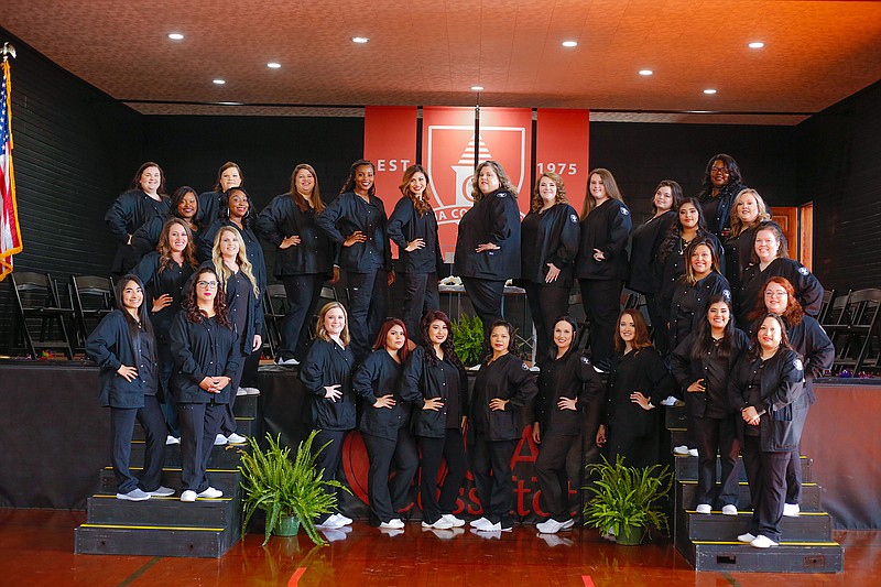 Thirty-one students received their nursing pin during the 2019 UA Cossatot LPN Pinning Ceremony held June 21 at the UA Cossatot Bank of Lockesburg Gymnasium. Shown are, first row from left, Leidy Aparicio, Stromie Garza, Autumn Jester, Brenda Alvarez, Veronica Castro, Cheyenne Ballard, Lauren King, Ana Martinez, Jennifer Howard and Sandybel Aparicio; second row Nina Wynn, Taylor Whittington, Jessica Gonzalez and Ashley Smallwood; third row Shernesia Broughton, Ashley Stuart, Leslie Guriterez-Cuella and Brittany Gray; and fourth row Kaylynn Brasel, Shandra Hamner, Jenna Howard, Shaglista Ware, Stephanie Zavala, Ashley Hill, Cheyenne Ballard, Brooklyn Arthur, Megan Carter and Leverise Evans. Not pictured are Adriana Figueroa and Selena Leon. (Submitted photo)