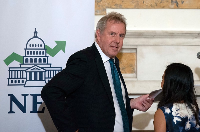 In this Friday, Oct. 20, 2017, file photo, British Ambassador Kim Darroch hosts a National Economists Club event at the British Embassy in Washington. Britain's ambassador to the United States resigned Wednesday, July 10, 2019, just days after diplomatic cables criticizing President Donald Trump caused embarrassment to two countries that often celebrate having a "special relationship." The resignation of Kim Darroch came a day after Trump lashed out at him on Twitter describing him as "wacky" and a "pompous fool" after leaked documents revealed the envoy's dim view of Trump's administration. (AP Photo/Sait Serkan Gurbuz, File)