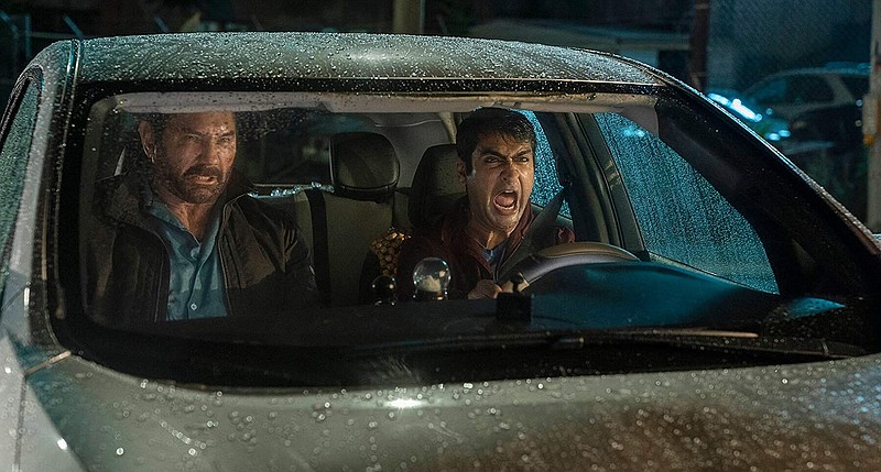 Dave Bautista and Kumail Nanjiani in "Stuber." (Twentieth Century Fox/TNS)