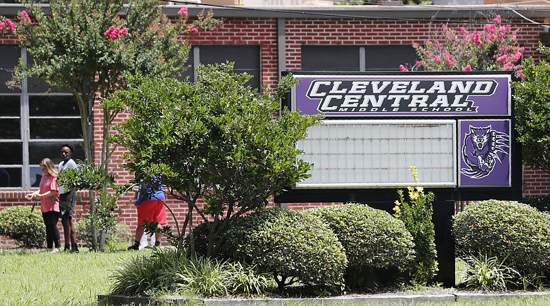 In this Friday, July 3, 2019 photo, an integrated group of students leave the Cleveland Central Middle School after finishing up their summer school studies for the day in Cleveland Miss. After a weeklong trial in 2015, a federal judge ordered the two middle schools and two high schools combined, and in August 2017, the school district began operating a new Cleveland Central Middle School based at the old East Side High, which had been predominantly African-American.(AP Photo/Rogelio V. Solis)