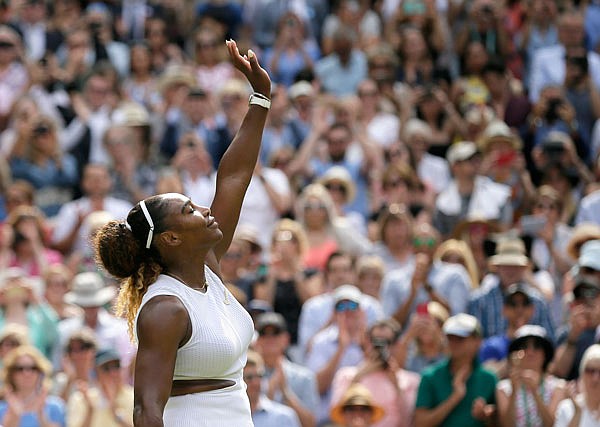 Serena Williams celebrates after defeating Barbora Strycova during Thursday's women's singles semifinal match on Day 10 of the Wimbledon Championships in London.