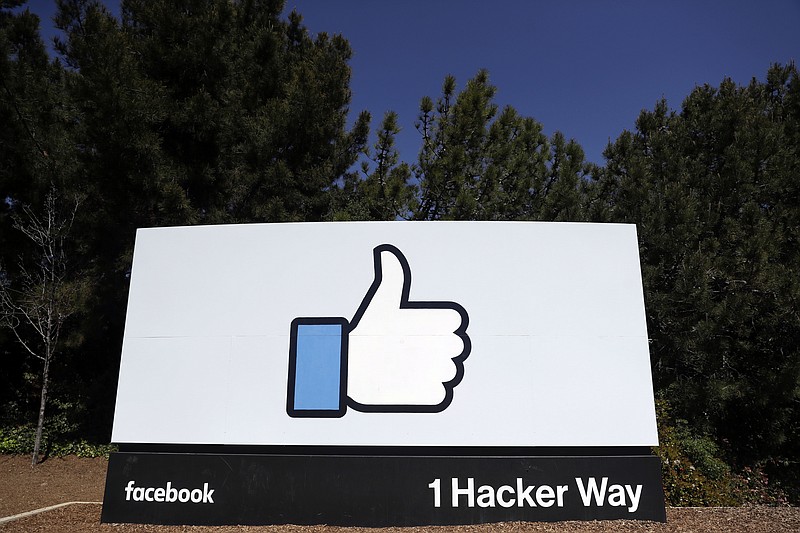 FILE- This March 28, 2018, file photo shows the Facebook logo at the company's headquarters in Menlo Park, Calif. (AP Photo/Marcio Jose Sanchez, File)