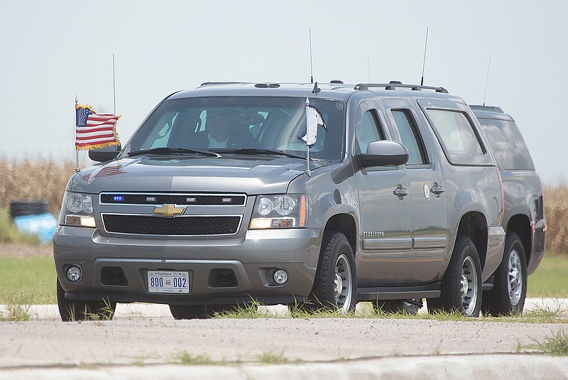 U.S. Vice President Mike Pence's motorcade enters the migrant tent city on Friday, July 12, 2019, in Donna, Texas. (Joel Martinez/The Monitor via AP)