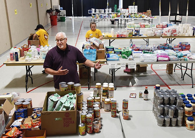 Ken Harland talks about the distribution system at Capital West Event Center and about the amount of consumable items still available for people to access at the Fairgrounds Road location. Harland is the administrative minister for Capital West Christian Church, which has made available the church's event center to be a place to temporarily house the items people needed in the immediate aftermath of the tornado and flooding. 