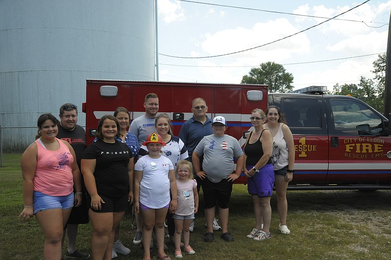 <p>Danisha Hogue/News Tribune</p><p>Family members of former Eldon police chief Charlie Wilson gathered Saturday at the re-opening of Wilson Park.</p>