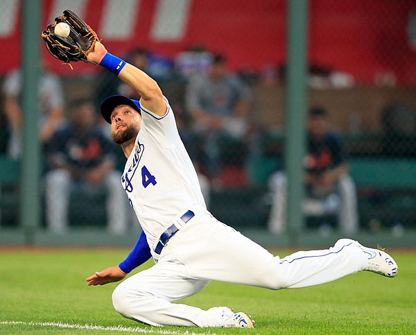 Royals left fielder Alex Gordon catches a fly ball hit by Victor Reyes of the Tigers during the eighth inning of Saturday night's game at Kauffman Stadium in Kansas City.