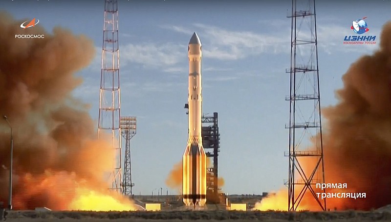 In this frame grab taken from video on Saturday, July 13, 2019, and distributed by Roscosmos Space Agency Press Service, a Russian Proton-M rocket takes off from the launch pad at Russia's space facility in Baikonur, Kazakhstan. A Russian Proton-M rocket successfully delivered a cutting-edge space telescope into orbit Saturday after days of launch delays, Russia's space agency said. (Roscosmos Space Agency Press Service photo via AP)