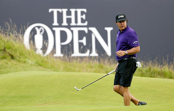 Phil Mickelson walks on the 18th green during a practice round Tuesday at Royal Portrush in Northern Ireland.