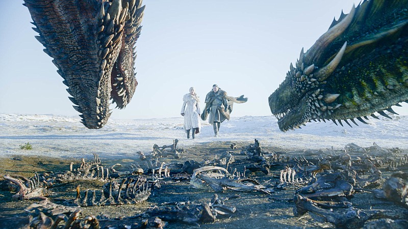 This image released by HBO shows Emilia Clarke, left, and Kit Harington in a scene from the final episode of "Game of Thrones."  On Tuesday, July 16, 2019, the program was nominated for an Emmy Award for outstanding drama series. (HBO via AP)