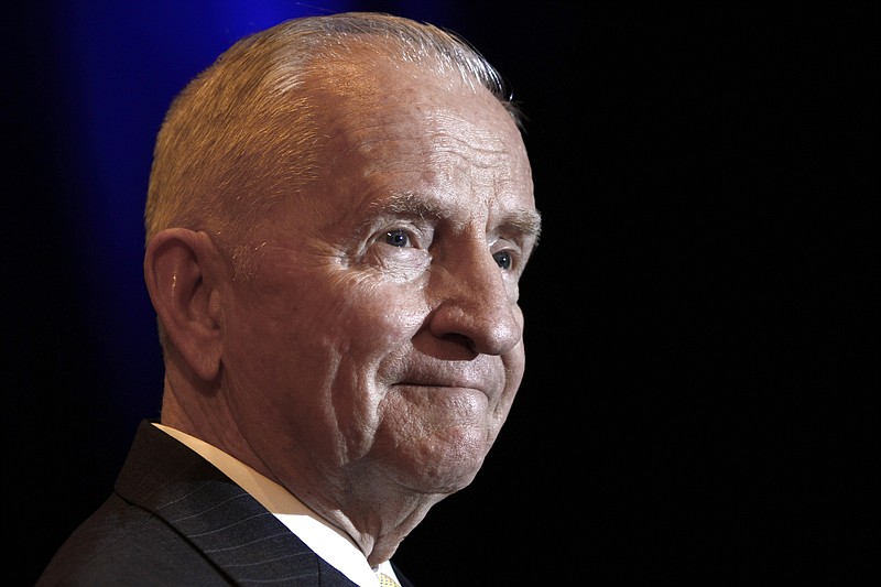  In this April 20, 2010, file photo, H. Ross Perot listens to a reporter's question during a news conference before accepting the Command and General Staff College Foundation's 2010 Distinguished Leadership Award in Kansas City, Mo. Family and friends are set to remember Perot, the colorful Texas billionaire who twice mounted outsider campaigns for president, at services in Dallas. A graveside service Tuesday, July 16, 2019, at a cemetery will be followed by a memorial service at Highland Park Methodist Church in the afternoon. (AP Photo/Ed Zurga, File)