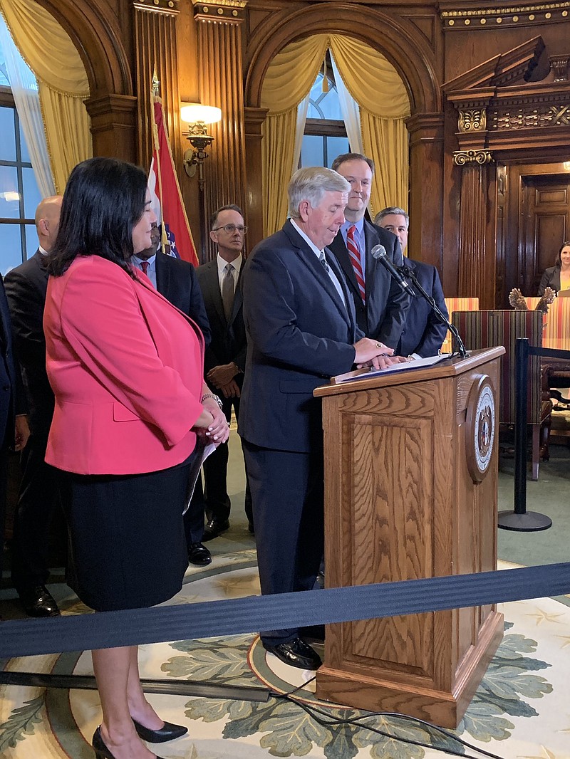 Missouri Gov. Mike Parson addresses reporters Tuesday, July 16, 2019, in his state Capitol office.