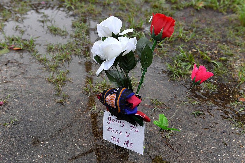 Flowers were left outside the Odell S. Williams Now and Then African American History Museum, whose founder, Sadie Roberts-Joseph, 75, was found dead in the trunk of a car Friday. (Matt McClain/The Washington Post)