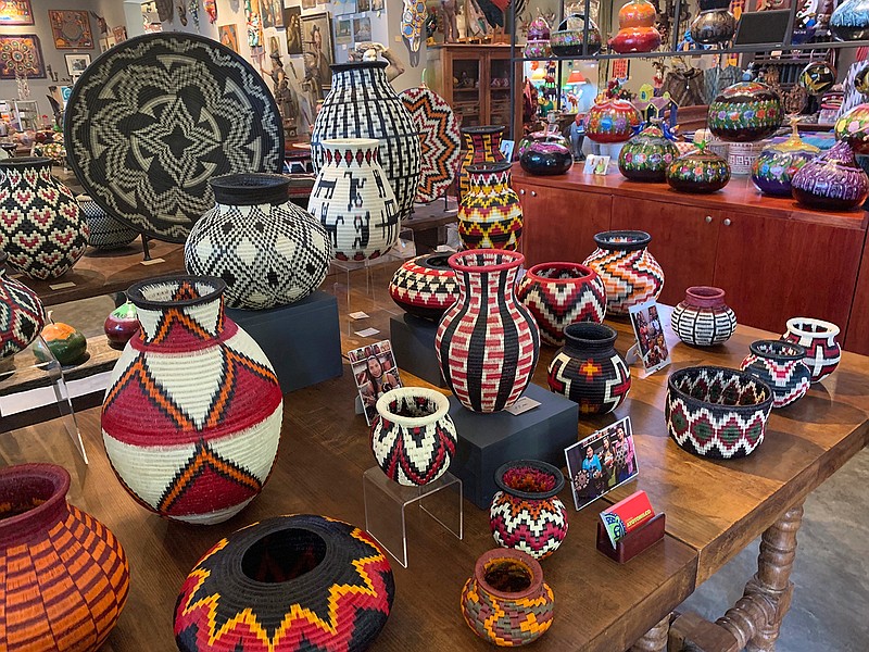 This June 17, 2019 photo shows a collection of Wounaan woven baskets from Colombia, at Galeria Atotonilco near San Miguel de Allende, Mexico. (Emil Varona/Kim Curtis via AP)