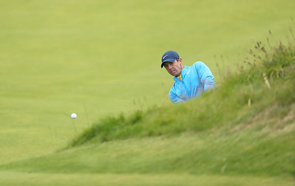 Rory McIlroy plays a shot on the fourth fairway during Wednesday's practice round ahead of the start of the British Open at Royal Portrush in Northern Ireland. The British Open starts today.