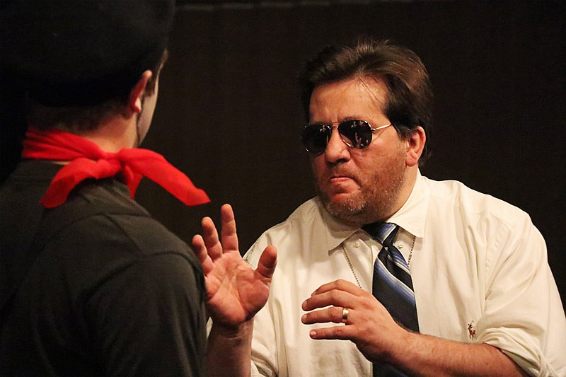 Terry Schoonover as Detective Starky tries to get information out of Ben Stumpe as Mime in "The Perfect Crime" during rehearsal Tuesday, July 16, 2019 for Scene One's Not-So-Short Attention Span Theatre. The original play was written by Keenan McMahon and can be seen with four other one-act plays July 18-20 and 25-27 at 7:30 p.m.