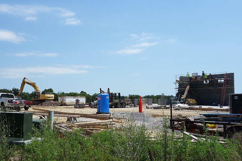 <p>Helen Wilbers/For the News Tribune</p><p>There are blue skies ahead for the new Callaway County Ambulance District headquarters. The damaged main building has been demolished following an April 2019 fire and will be rebuilt, and the adjacent apparatus bay is well underway.</p>