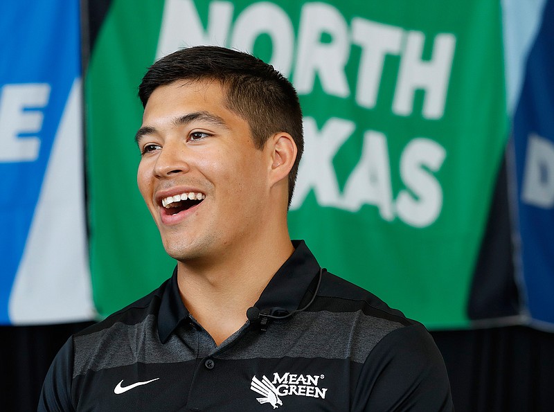 North Texas quarterback Mason Fine responds to questions in an interview during  the Conference USA college football media day Wednesday, July 17, 2019, in Frisco, Texas. (AP Photo/Tony Gutierrez)